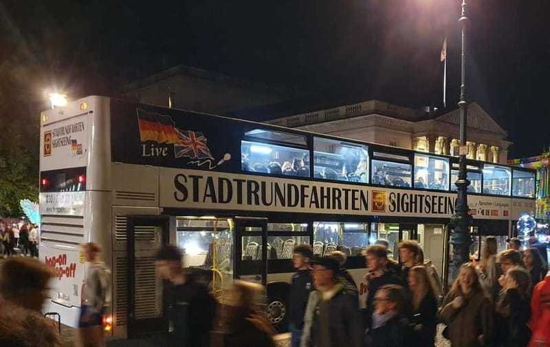 Berlin: Bus Tour by Night with Live Commentary - Potsdamer Platz and Friedrichstraße: Where the Lights Feel Most Playful