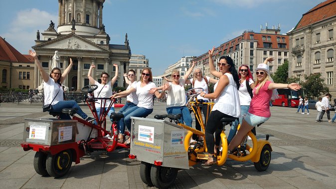 Berlin : Guided Private Sightseeing Tours with Funbikes, Teambikes - Potsdamer Platz and the Berlin Wall fragments: how modern Berlin grew from old division