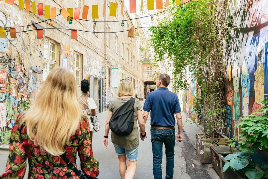 Berlin: Hidden Backyards Guided Walking Tour - Haus Schwarzenberg: art studios, street art, and a yard with many lives