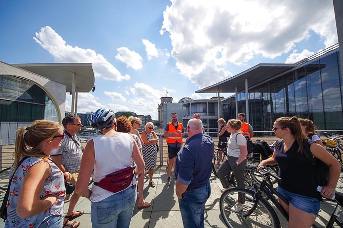 Berlin Highlights Sightseeing Bike Tour in Small Groups - Checkpoint Charlie to Gendarmenmarkt: From Border Theater to Elegant Squares