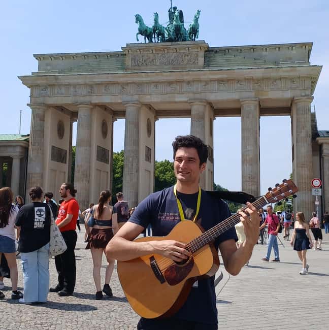 Berlin: Historical Walking Tour with Live Music - Checkpoint Charlie finish: Bowie-era Berlin through music