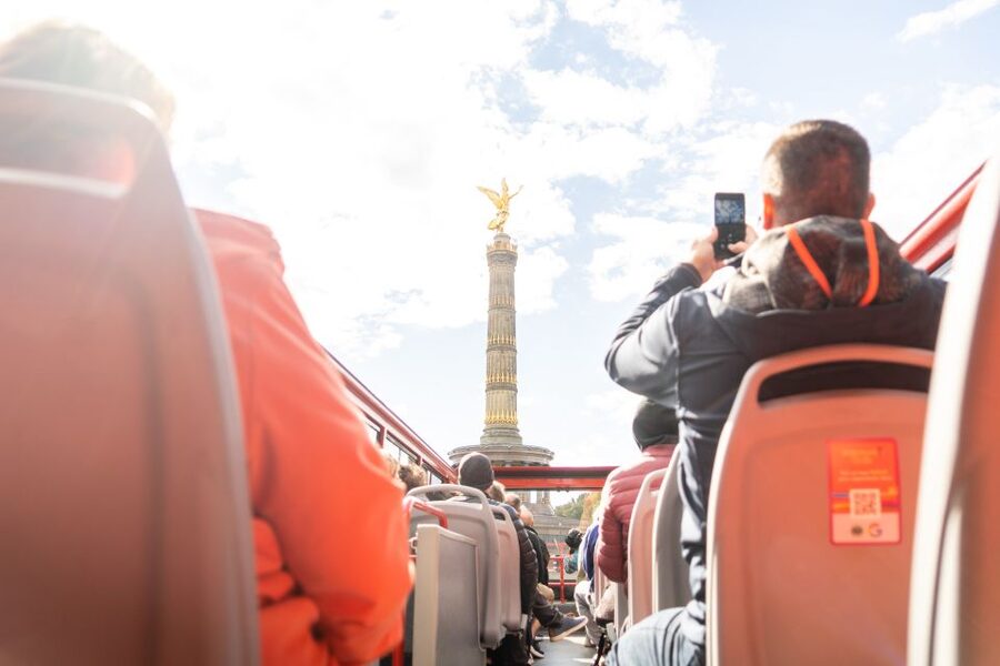 Berlin: Hop-On-Hop-Off Bus with Boat Cruise Option - Stop-by-Stop: Checkpoint Charlie, Gendarmenmarkt, Neptunbrunnen, and the Route to the Brandenburg Gate