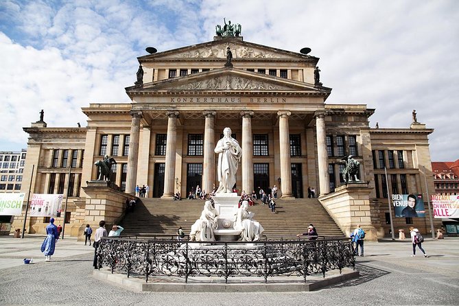 Discover Berlin Half-Day Walking Tour - Berlin Wall symbolism, “death strip” context, and Checkpoint Charlie