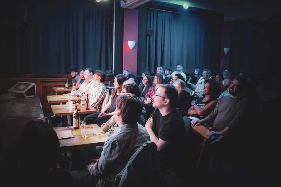 English Stand-Up Comedy Show with Free Pizza and Free Shots - Practical Rules Inside the Room (So You Don’t Get Stopped)