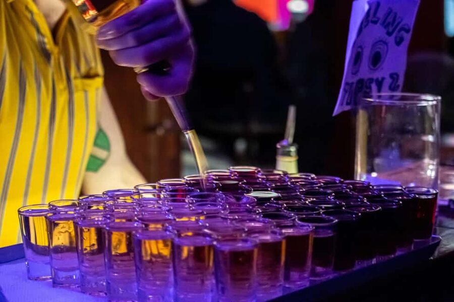 English Stand-Up Comedy Show with Free Pizza and Free Shots - Who This Is Perfect For (and Who Might Skip)
