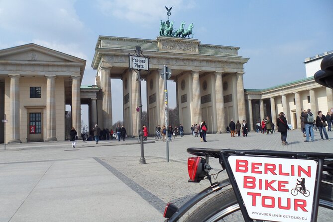 Half-Day Guided Bike Tour of Central Berlin's Highlights - Brandenburg Gate and the shift from empire to reckoning