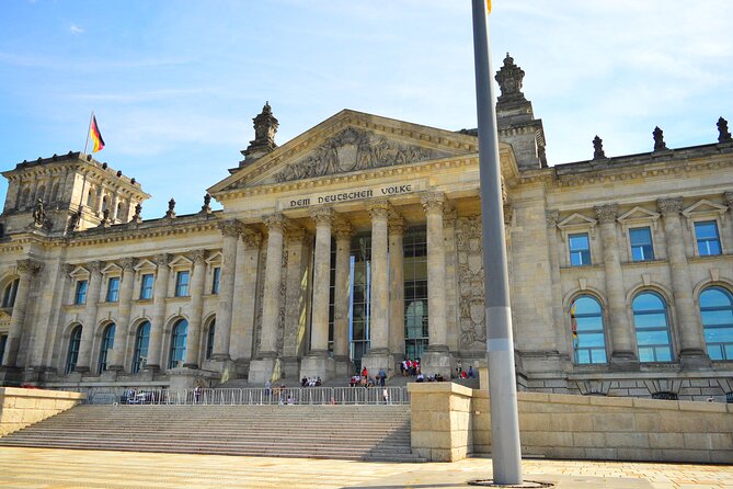 Private Berlin: Iconic Sights and Hidden Gems Walking Tour - Checkpoint Charlie: the border as a performance
