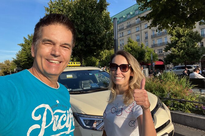 Private Taxi Tour of Berlin + Extras – Extended & Relaxed 6-8h - Brandenburg Gate, Potsdamer Platz, and Sony Center: the day starts in Berlin’s “parlor”