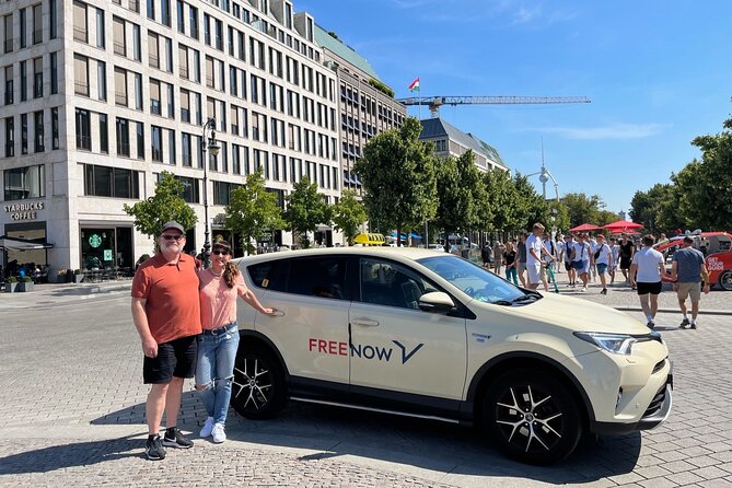 Welcome/Farewell SightseeingTaxi Tour +Transfer from/to the airport - Hackesche Höfe, Sophienkirche Area, and Alexanderplatz: Old Streets and Socialist Big Ideas